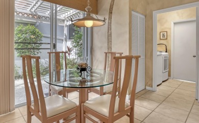 NESTLED IN THE EXCLUSIVE 24/7 DOUBLE-GATED PRIVATE COMMUNITY OF on PGA National Golf Club in Florida - for sale on GolfHomes.com, golf home, golf lot