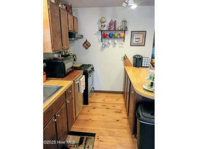 This is a great country house to accommodate a single family or on Land-O-Lakes Golf Course in North Carolina - for sale on GolfHomes.com, golf home, golf lot