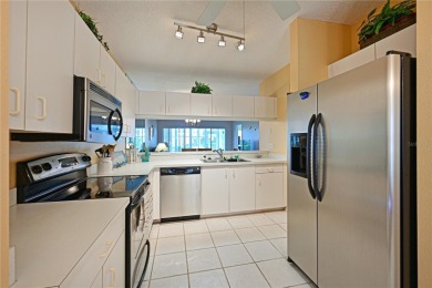 Welcome to this bright and airy first-floor condo in the on Peridia Golf and Country Club in Florida - for sale on GolfHomes.com, golf home, golf lot