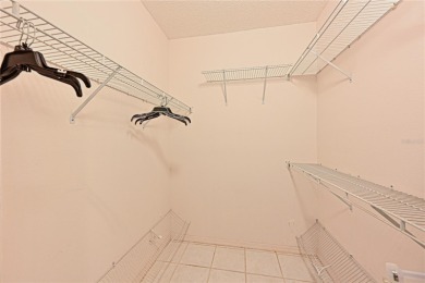 Welcome to this bright and airy first-floor condo in the on Peridia Golf and Country Club in Florida - for sale on GolfHomes.com, golf home, golf lot