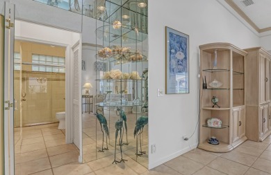 NESTLED IN THE EXCLUSIVE 24/7 DOUBLE-GATED PRIVATE COMMUNITY OF on PGA National Golf Club in Florida - for sale on GolfHomes.com, golf home, golf lot