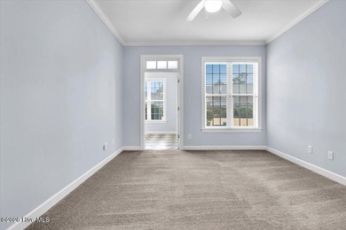 Nestled in the heart of the Magnolia Greens golf community, this on Magnolia Greens Golf Plantation in North Carolina - for sale on GolfHomes.com, golf home, golf lot