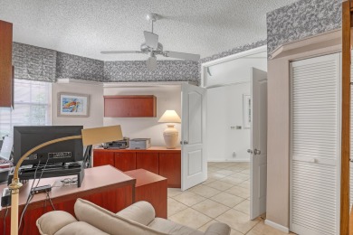 NESTLED IN THE EXCLUSIVE 24/7 DOUBLE-GATED PRIVATE COMMUNITY OF on PGA National Golf Club in Florida - for sale on GolfHomes.com, golf home, golf lot