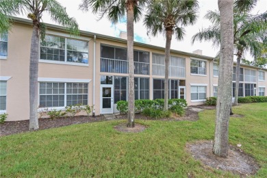 Welcome to this bright and airy first-floor condo in the on Peridia Golf and Country Club in Florida - for sale on GolfHomes.com, golf home, golf lot
