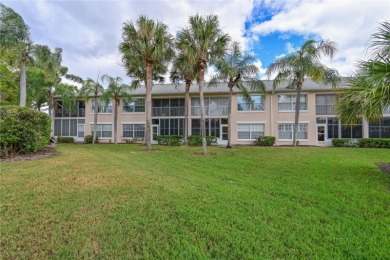 Welcome to this bright and airy first-floor condo in the on Peridia Golf and Country Club in Florida - for sale on GolfHomes.com, golf home, golf lot