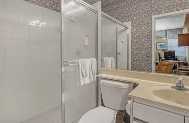 NESTLED IN THE EXCLUSIVE 24/7 DOUBLE-GATED PRIVATE COMMUNITY OF on PGA National Golf Club in Florida - for sale on GolfHomes.com, golf home, golf lot