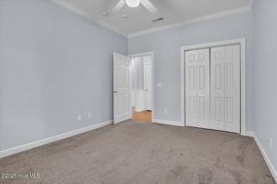 Nestled in the heart of the Magnolia Greens golf community, this on Magnolia Greens Golf Plantation in North Carolina - for sale on GolfHomes.com, golf home, golf lot