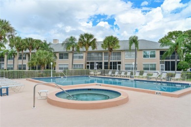Welcome to this bright and airy first-floor condo in the on Peridia Golf and Country Club in Florida - for sale on GolfHomes.com, golf home, golf lot