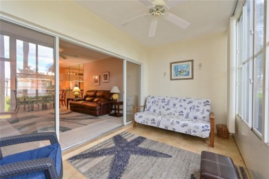 Welcome to this bright and airy first-floor condo in the on Peridia Golf and Country Club in Florida - for sale on GolfHomes.com, golf home, golf lot