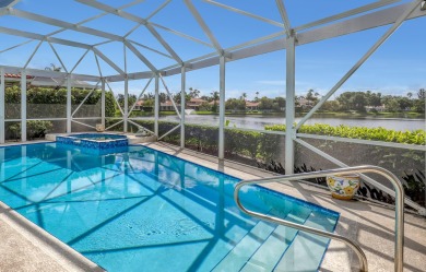 NESTLED IN THE EXCLUSIVE 24/7 DOUBLE-GATED PRIVATE COMMUNITY OF on PGA National Golf Club in Florida - for sale on GolfHomes.com, golf home, golf lot