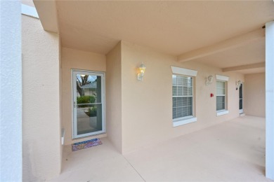 Welcome to this bright and airy first-floor condo in the on Peridia Golf and Country Club in Florida - for sale on GolfHomes.com, golf home, golf lot