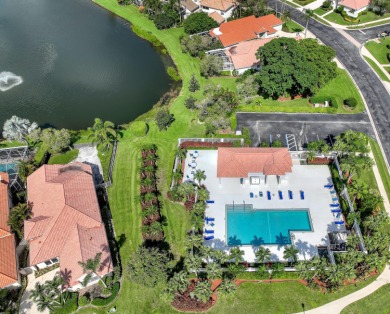 NESTLED IN THE EXCLUSIVE 24/7 DOUBLE-GATED PRIVATE COMMUNITY OF on PGA National Golf Club in Florida - for sale on GolfHomes.com, golf home, golf lot