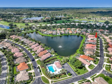NESTLED IN THE EXCLUSIVE 24/7 DOUBLE-GATED PRIVATE COMMUNITY OF on PGA National Golf Club in Florida - for sale on GolfHomes.com, golf home, golf lot