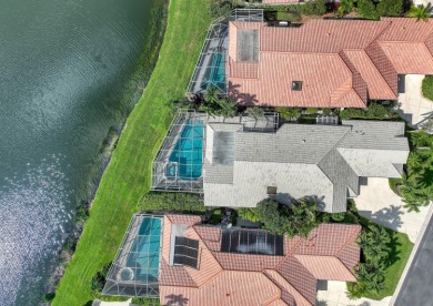 NESTLED IN THE EXCLUSIVE 24/7 DOUBLE-GATED PRIVATE COMMUNITY OF on PGA National Golf Club in Florida - for sale on GolfHomes.com, golf home, golf lot