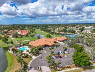 Welcome to this bright and airy first-floor condo in the on Peridia Golf and Country Club in Florida - for sale on GolfHomes.com, golf home, golf lot