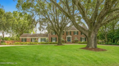 This gracious, Georgian brick estate is on a beautiful .90 acre on The Deerwood Country Club in Florida - for sale on GolfHomes.com, golf home, golf lot