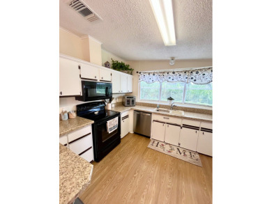 If you're looking for a move-in ready home with exceptional on Pine Lakes Country Club in Florida - for sale on GolfHomes.com, golf home, golf lot