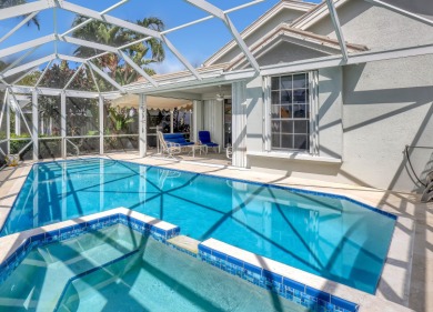 NESTLED IN THE EXCLUSIVE 24/7 DOUBLE-GATED PRIVATE COMMUNITY OF on PGA National Golf Club in Florida - for sale on GolfHomes.com, golf home, golf lot