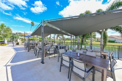 Welcome to this bright and airy first-floor condo in the on Peridia Golf and Country Club in Florida - for sale on GolfHomes.com, golf home, golf lot
