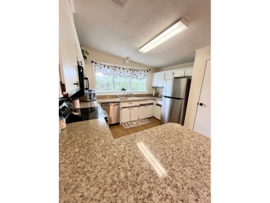 If you're looking for a move-in ready home with exceptional on Pine Lakes Country Club in Florida - for sale on GolfHomes.com, golf home, golf lot