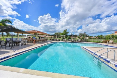 Welcome to this bright and airy first-floor condo in the on Peridia Golf and Country Club in Florida - for sale on GolfHomes.com, golf home, golf lot
