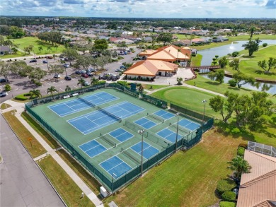 Welcome to this bright and airy first-floor condo in the on Peridia Golf and Country Club in Florida - for sale on GolfHomes.com, golf home, golf lot