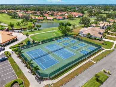 Welcome to this bright and airy first-floor condo in the on Peridia Golf and Country Club in Florida - for sale on GolfHomes.com, golf home, golf lot
