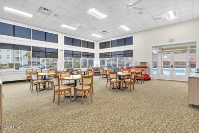 Nestled in the heart of the Magnolia Greens golf community, this on Magnolia Greens Golf Plantation in North Carolina - for sale on GolfHomes.com, golf home, golf lot