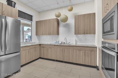 Nestled in the heart of the Magnolia Greens golf community, this on Magnolia Greens Golf Plantation in North Carolina - for sale on GolfHomes.com, golf home, golf lot