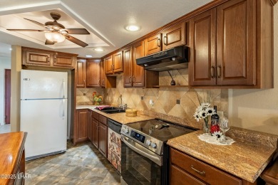Welcome to the gated community of Queen's Bay Resort & on London Bridge Golf Course in Arizona - for sale on GolfHomes.com, golf home, golf lot