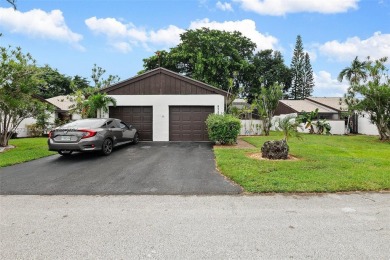 Nestled in the heart of the vibrant and rapidly growing Tamarac on Colony West Country Club in Florida - for sale on GolfHomes.com, golf home, golf lot