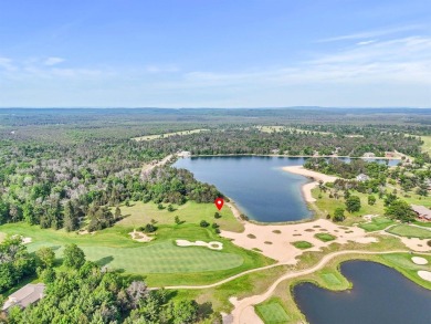 Embrace the pinnacle of golfing luxury with this extraordinary on Forest Dunes Golf Club in Michigan - for sale on GolfHomes.com, golf home, golf lot