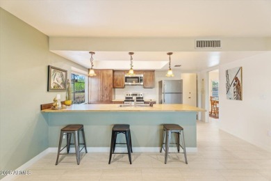 Discover your dream home nestled against the 17th tee of a on Ahwatukee Country Club in Arizona - for sale on GolfHomes.com, golf home, golf lot