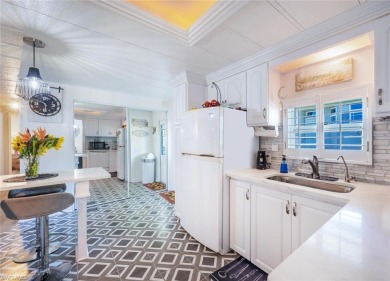 This lovely home has custom updates throughout that give it a on Riviera Golf Club in Florida - for sale on GolfHomes.com, golf home, golf lot