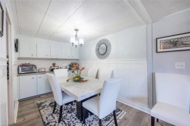 This lovely home has custom updates throughout that give it a on Riviera Golf Club in Florida - for sale on GolfHomes.com, golf home, golf lot