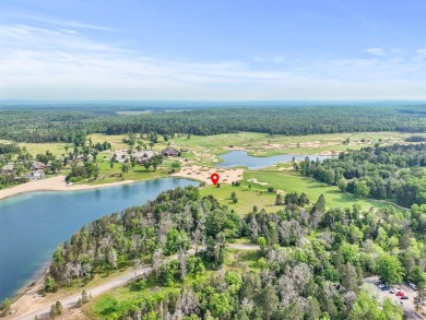 Embrace the pinnacle of golfing luxury with this extraordinary on Forest Dunes Golf Club in Michigan - for sale on GolfHomes.com, golf home, golf lot