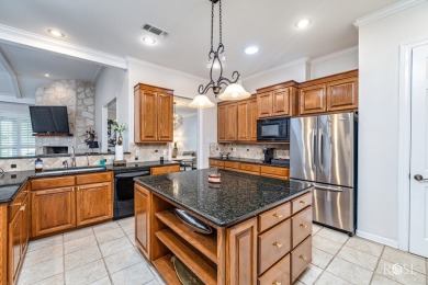 This beautifully updated, open floor plan home sits right on the on Bentwood Country Club in Texas - for sale on GolfHomes.com, golf home, golf lot