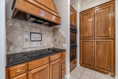 This beautifully updated, open floor plan home sits right on the on Bentwood Country Club in Texas - for sale on GolfHomes.com, golf home, golf lot