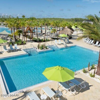 Immaculate 2BR/2BA  Den home on a premium water view lot in on LPGA International Golf Course in Florida - for sale on GolfHomes.com, golf home, golf lot