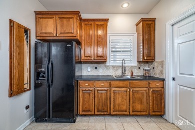 This beautifully updated, open floor plan home sits right on the on Bentwood Country Club in Texas - for sale on GolfHomes.com, golf home, golf lot