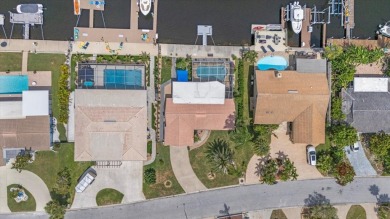 Welcome to your piece of coastal paradise at 5340 Pilots Place on Gulf Harbors Golf Course in Florida - for sale on GolfHomes.com, golf home, golf lot