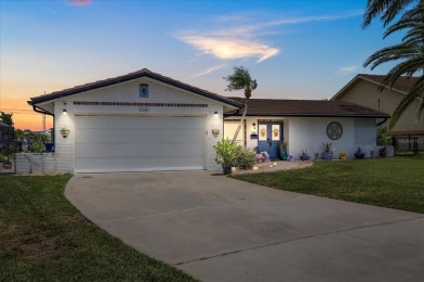 Welcome to your piece of coastal paradise at 5340 Pilots Place on Gulf Harbors Golf Course in Florida - for sale on GolfHomes.com, golf home, golf lot