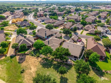 This beautifully updated, open floor plan home sits right on the on Bentwood Country Club in Texas - for sale on GolfHomes.com, golf home, golf lot