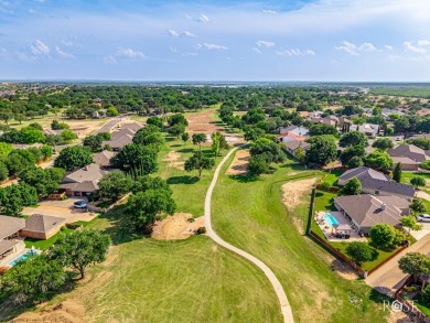 This beautifully updated, open floor plan home sits right on the on Bentwood Country Club in Texas - for sale on GolfHomes.com, golf home, golf lot