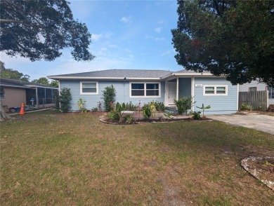 This beautifully maintained three-bedroom, two-bathroom home on The Dunedin Country Club in Florida - for sale on GolfHomes.com, golf home, golf lot