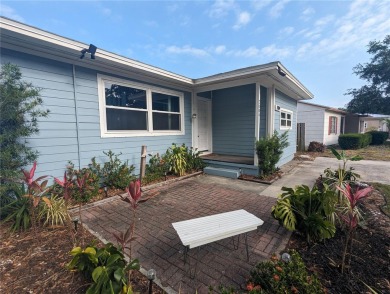 This beautifully maintained three-bedroom, two-bathroom home on The Dunedin Country Club in Florida - for sale on GolfHomes.com, golf home, golf lot