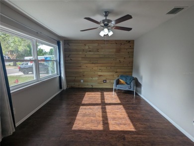 This beautifully maintained three-bedroom, two-bathroom home on The Dunedin Country Club in Florida - for sale on GolfHomes.com, golf home, golf lot