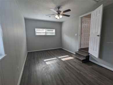 This beautifully maintained three-bedroom, two-bathroom home on The Dunedin Country Club in Florida - for sale on GolfHomes.com, golf home, golf lot