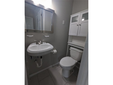 This beautifully maintained three-bedroom, two-bathroom home on The Dunedin Country Club in Florida - for sale on GolfHomes.com, golf home, golf lot