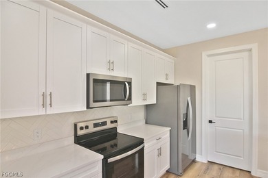 Come view this gorgeous brand-new home nestled feet away from on Burnt Store Golf Club in Florida - for sale on GolfHomes.com, golf home, golf lot